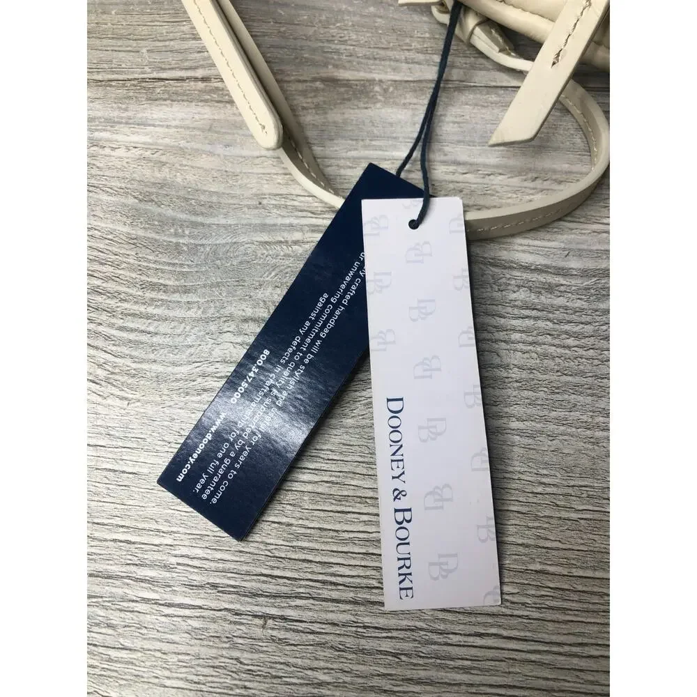 Dooney and Bourke Cream Triple Zip Crossbody NWT W dustbag and registration